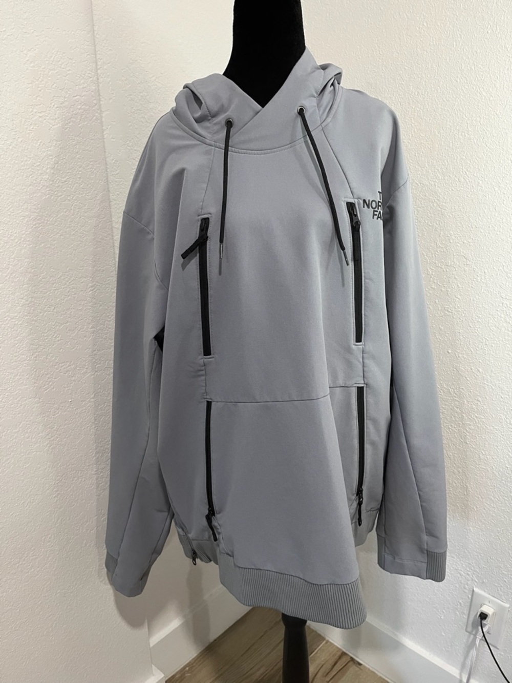 The North Face Light Gray Pullover Jacket with Black Zippers
